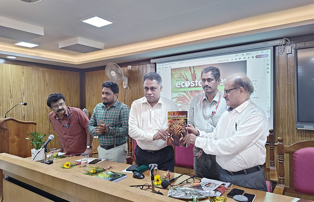 Release of Ecostat News May 2024 by Sri. P C Mohanan Chairman KSSC by handing over a copy to Dr. Saji Gopinath VC DUK & KTU