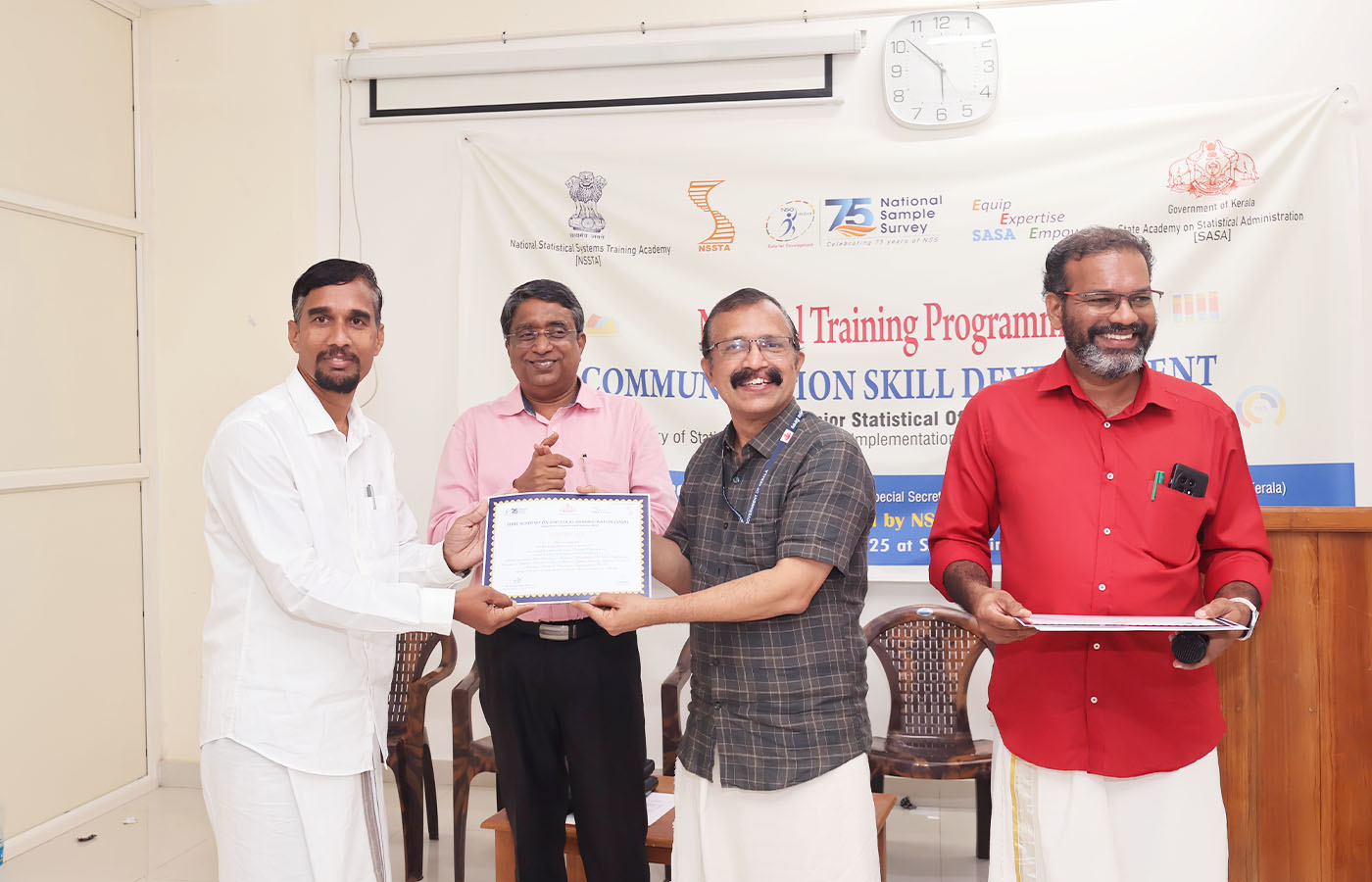 Presenting certificate to Sri. Ramniwas Meena, Senior Statistical Officer, NSO (FOD) RO Ajmer, Rajasthan
