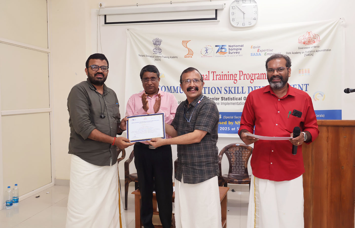 Presenting certificate to Sri. Nitin Saini, Senior Statistical Officer, NSO (FOD) SRO Faridkot, Punjab